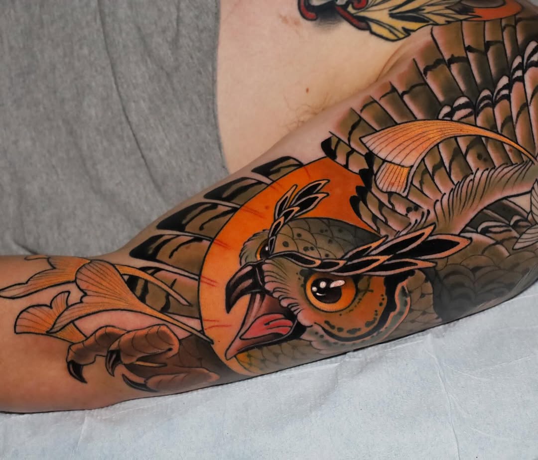 Orange and brown owl with spread wings and detailed feathers on the forearm, featuring black outlines and shading.
