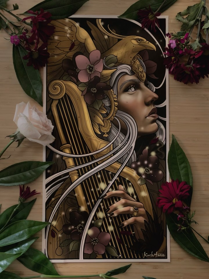 Detailed portrait tattoo design featuring a woman's profile with ornate gold filigree, flowing hair, bird motif, and purple flowers in gold and neutral tones.