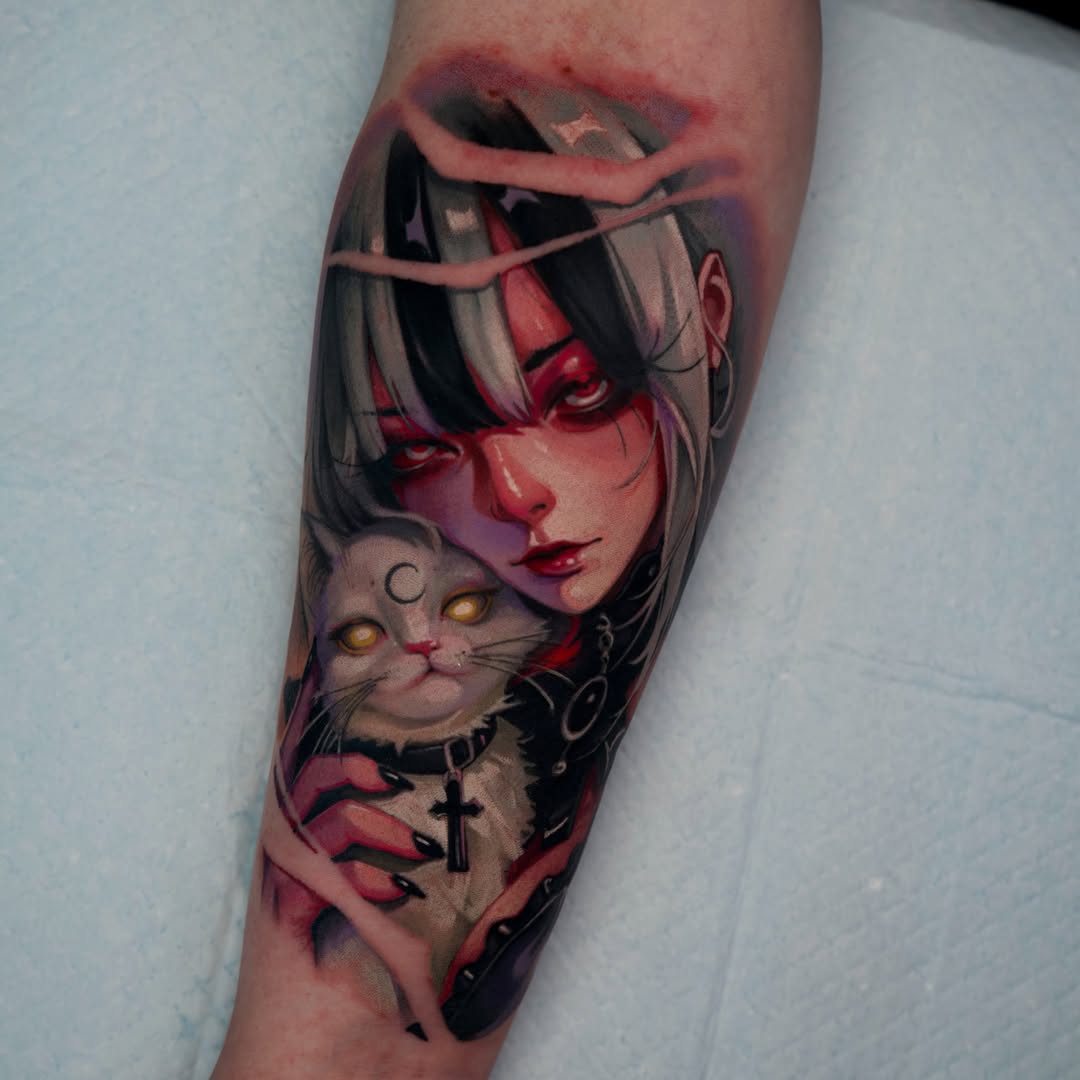 Colorful tattoo on forearm featuring an anime-style female character with dark hair and cat with golden eyes, accented with red lips and religious symbols.